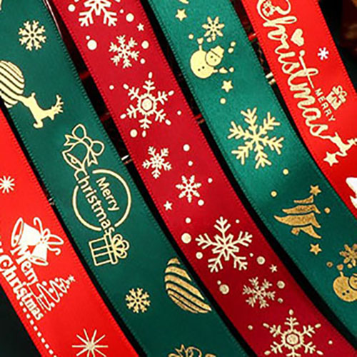 This image has an empty alt attribute; its file name is Christmas-ribbons-2.jpg